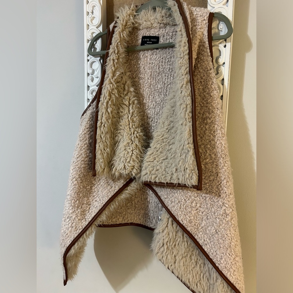 Really cute fur/fleece vest